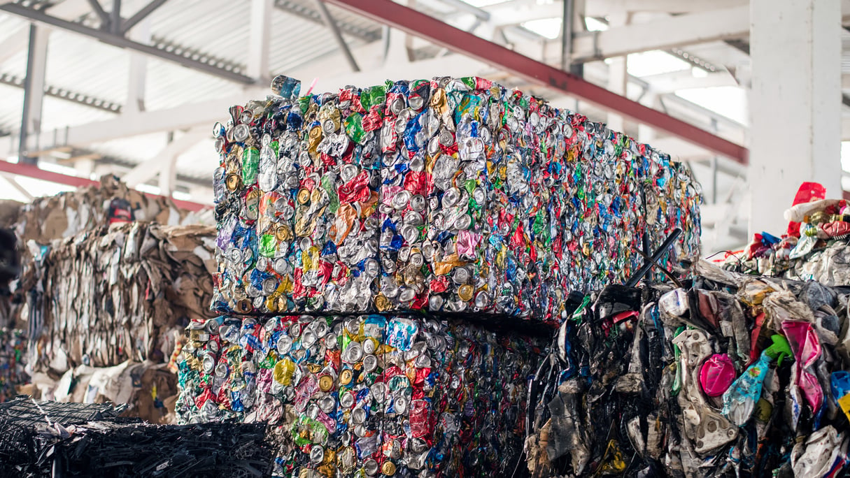 Compressed metal garbage at waste sorting plant